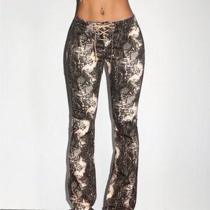 Snake-Print Lace-Up Women’s Flare Pants in Black and Cream